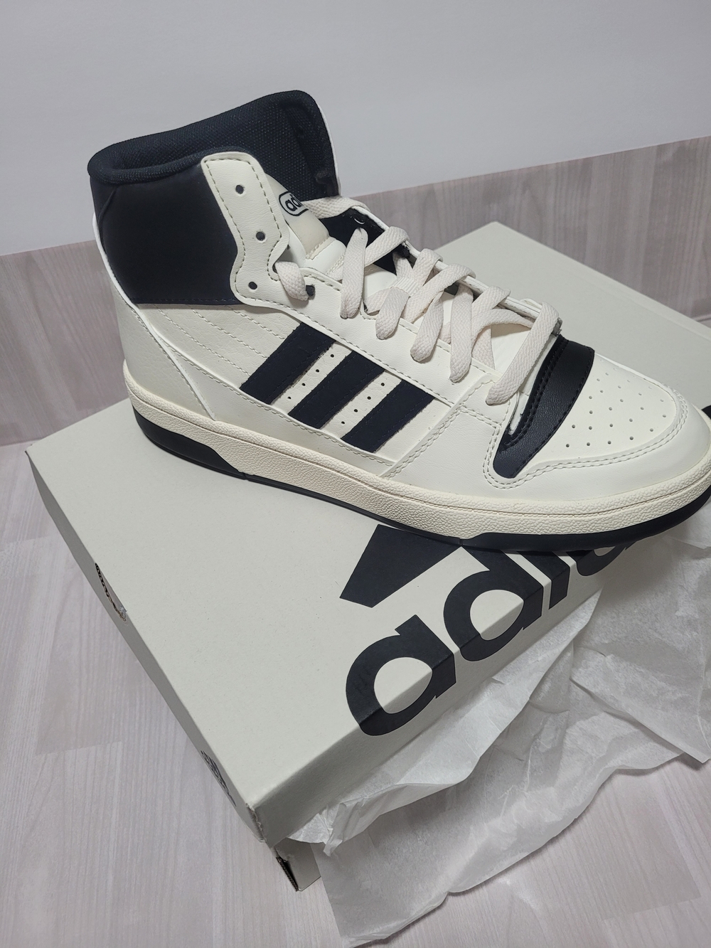 Adidas Women’s White and Black High-Top Sneakers